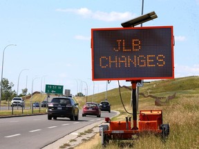 An electronic sign notifies citizens of upcoming changes near 19 St. N.W. and John Laurie Blvd. in Calgary on Wednesday, August 17, 2022.