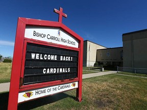 A sign in front of Bishop Carroll High School in Calgary is pictured on Tuesday, August 30, 2022.