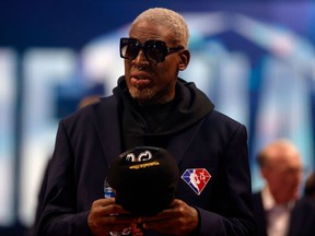 Dennis Rodman reacts after being introduced as part of the NBA 75th Anniversary Team during the 2022 NBA All-Star Game at Rocket Mortgage Fieldhouse on February 20, 2022 in Cleveland, Ohio. (Photo by Tim Nwachukwu/Getty Images)