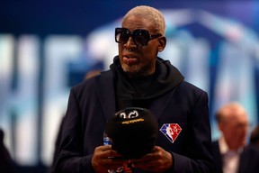 Dennis Rodman reacts after being introduced as part of the NBA 75th Anniversary Team during the 2022 NBA All-Star Game at Rocket Mortgage Fieldhouse on February 20, 2022 in Cleveland, Ohio. (Photo by Tim Nwachukwu/Getty Images)