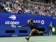Serena Williams returns a shot to Anett Kontaveit during the second round of the U.S. Open tennis championships in New York City, Wednesday, Aug. 31, 2022.