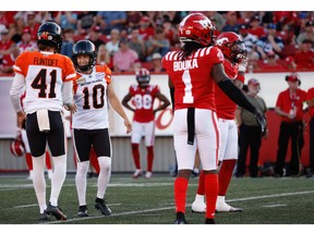 BC Lions kicker Sean Whyte celebrates with holder Stefan Flintoft after game winning field goal against the Calgary Stampeders  during CFL football in Calgary on Saturday, August 13, 2022. Al CHAREST / POSTMEDIA