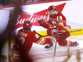 Calgary Flames forward Andrew Mangiapane celebrates after scoring the game-winner against the Dallas Stars during Game 5 of their first-round playoff series at the Scotiabank Saddledome in Calgary on May 11, 2022.