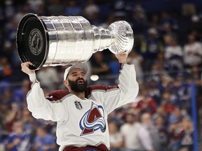 Then-Colorado Avalanche centre Nazem Kadri celebrates with the Stanley Cup.