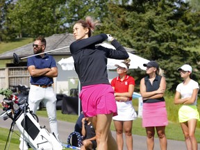 Michelle Y West taking a shot during Blake Women's Day at Canyon Meadows Golf & Country Club on Monday, August 1, 2022.