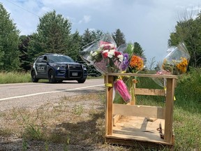 A memorial is shown near the scene of a fatal crash in Barrie, Ont., Monday, Aug. 29, 2022. Police in Barrie, Ont., continue to investigate a crash that left six young people dead over the weekend.