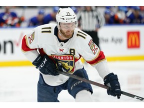 FILE -Florida Panthers' Jonathan Huberdeau (11) skates during the third period of an NHL hockey game against the New York Islanders Tuesday, April 19, 2022, in Elmont, N.Y. Matthew Tkachuk is being traded to the Florida Panthers, part of a blockbuster that sends Jonathan Huberdeau to the Calgary Flames in a swap of players who are each coming off the best season of their careers, a person with knowledge of the negotiations said Friday night, July 22, 2022.