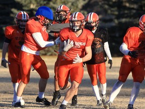 The St. Francis Browns of Calgary will renew their rivalry with the Harry Ainlay Titans of Edmonton on Friday as the Alberta high school football season kicks off.