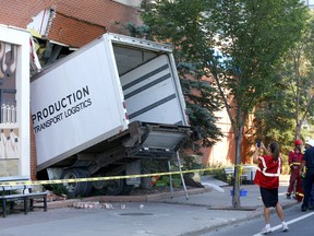 A cargo truck is pictured after it slammed into the Midtown Co-op in downtown Calgary on Thursday, August 18, 2022.