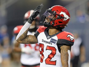 Calgary Stampeders receiver Malik Henry celebrates one of his three touchdowns against the Winnipeg Blue Bombers at IG Field in Winnipeg on Thursday, Aug. 25, 2022.