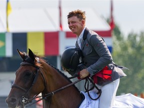 Matthew Sampson, riding Elisa BJX, wins the Telus Cup during Spruce Meadows’ Masters tournament on Wednesday, Sept. 7, 2022.