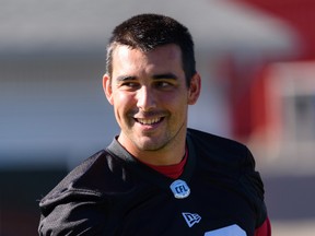 Calgary Stampeders quarterback Jake Maier is all smiles at practice Tuesday after signing a two-year deal with the team.