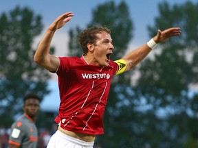 Cavalry FC’s Mason Trafford celebrates the team’s winning goal during a 2-1 victory against Forge FC on ATCO Field at Spruce Meadows on Aug. 12, 2022.