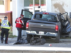 Calgary police investigate the scene of a fatal accident on 17th Avenue and 36 Street S.E. in Calgary on Sunday, September 18, 2022.