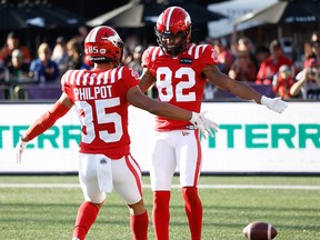 Calgary Stampeders Malik Henry celebrates after his touchdown with teammate Jalen Philpot against the BC Lions during CFL football in Calgary on Saturday, September 17, 2022.