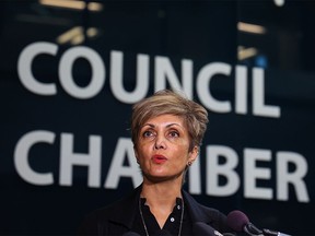 Calgary Mayor Jyoti Gondek speaks with media outside council chambers on Tuesday, July 26, 2022.