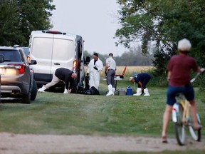 A police forensics team investigates a crime scene after multiple people were killed and injured in a stabbing spree in Weldon, Saskatchewan, Canada. September 4, 2022. REUTERS/David Stobbe/File Photo