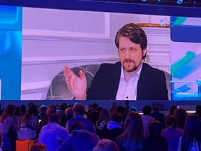 Former contractor of U.S. National Security Agency Edward Snowden is seen on a screen during his interview presented via video link at the New Knowledge educational online forum in Moscow, Sept. 2, 2021.