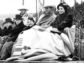 Princess Elizabeth, accompanied by The Duke of Edinburgh, attend a mini-Stampede performance during  a royal visit to Calgary in October 1951.