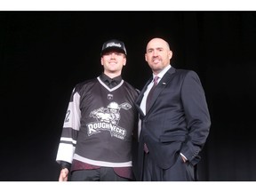 Seth Van Schepen and NLL Commissioner  Brett Frood pose for a photo after the Roughnecks took the former Oakville Rock star 10th overall in the NLL draft.