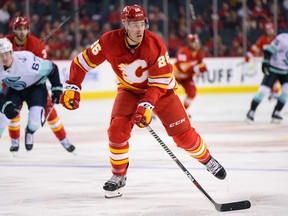 Calgary Flames Michael Stone against Seattle Kraken during the third period of NHL preseason action at Scotiabank Saddledome on Monday, October 3, 2022.