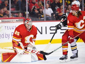 Calgary Flames goaltender Jacob Markstrom makes a save against the Pittsburgh Penguins at Scotiabank Saddledome on Tuesday, Oct.  25, 2022.