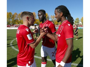 Calvary Roberto Alarcon (L) and Ali Musse celebrate a 2-1 victory CPL soccer action between Cavalry FC and Valour FC at ATCO Field at Spruce Meadows in Calgary on Sunday, October 2, 2022. The pair teamed up on the winning goal. Jim Wells/Postmedia