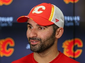 Calgary Flames forward Nazem Kadri is interviewed by media in the Flames’ dressing room on Wednesday, October 12, 2022.