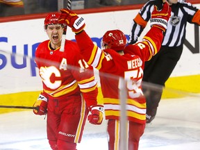 Calgary Flames' Mikael Backlund scores the game winner against Vegas Golden Knights goalie Logan Thompson in the third period of NHL action at the Scotiabank Saddledome in Calgary on Tuesday, October 18, 2022.