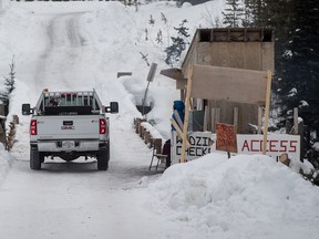 A Coastal GasLink contractor drives over a bridge on a remote logging road near Houston, B.C., on Thursday January 17, 2019.