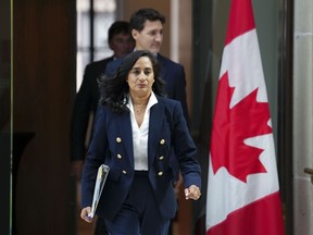 Minister of National Defence Anita Anand and Prime Minister Justin Trudeau arrive to hold a press conference in Ottawa on Monday, Sept. 26, 2022.