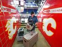 Rogers SportsNet staff set up TV camera equipment at Scotiabank Saddledome ahead of the Calgary Flames Thursday home opener against the Colorado Avalanche. 