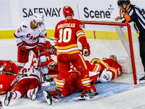 Calgary Flames goaltender Jacob Markstrom makes a save late in the third period against the Carolina Hurricanes at the Scotiabank Saddledome in Calgary on Saturday, Oct. 22, 2022.