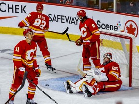 Calgary Flames react after giving up a goal to Zach Hyman of the Edmonton Oilers during NHL hockey at the Scotiabank Saddledome in Calgary on Saturday, October 29, 2022. AL CHAREST/POSTMEDIA