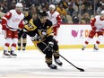 Sep 27, 2022; Pittsburgh, Pennsylvania, USA; Pittsburgh Penguins center Sidney Crosby (87) handles the puck against the Detroit Red Wings during the first period at PPG Paints Arena.