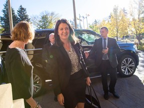 Danielle Smith entering Government House before being sworn in as Premier of Alberta on Tuesday, Oct. 11, 2022, in Edmonton.