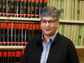 Court of Appeal Justice Ritu Khullar poses for a photo in the law library at Court of Queen's Bench in Edmonton, on Wednesday, March 28, 2018. Khullar was named Alberta Chief Justice on Nov. 28, 2022.