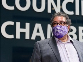 Then-mayor Naheed Nenshi speaks with media outside Calgary Council Chambers in this photo from June 23, 2021.