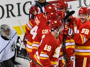 The Calgary Flames celebrate a goal against the Los Angeles Kings at Scotiabank Saddledome in Calgary on Monday, Nov. 14, 2022.