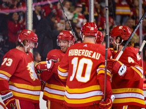 The Calgary Flames celebrate a goal against the Los Angeles Kings at Scotiabank Saddledome on Monday, Nov. 14, 2022. The Flames, who won this game 6-5, are embarking on a six-game road-trip that includes a matchup against Jonathan Huberdeau’s former team, the Florida Panthers.