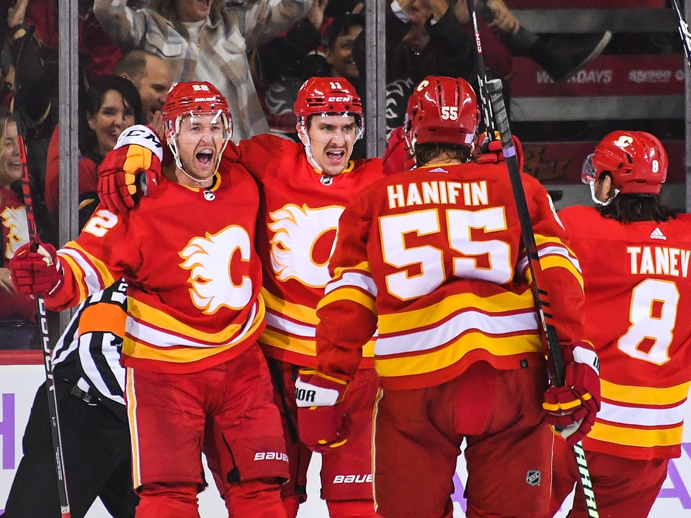 Adam Ruzicka of the Calgary Flames celebrates his goal with teammates  News Photo - Getty Images