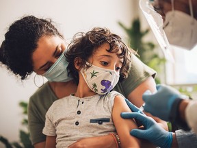 A child receiving a vaccine.