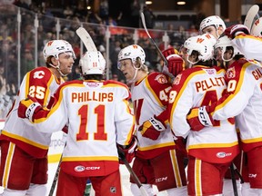 CALGARY, AB - NOVEMBER 27, 2022: The Calgary Wranglers won 4-3 in OT against the Abbotsford Canucks at the Scotiabank Saddledome on Sunday afternoon (Angela Burger/Calgary Wranglers).