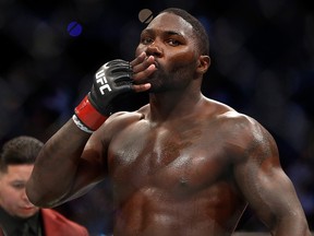 Anthony Johnson celebrates his first-round knockout win over Glover Teixeira at UFC 202 at T-Mobile Arena on August 20, 2016 in Las Vegas.