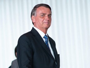 President of Brazil Jair Bolsonaro arrives for a press conference two days after being defeated by Lula da Silva in the presidential runoff, in Brasilia, Tuesday, Nov. 1, 2022.