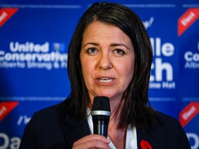 Premier Danielle Smith celebrates her win in a byelection in Medicine Hat late Tuesday night.