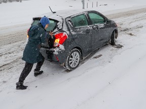 Cars were stuck and sliding on an icy 29th Street N.W. as Calgary was hit by a major snowstorm on Wednesday.