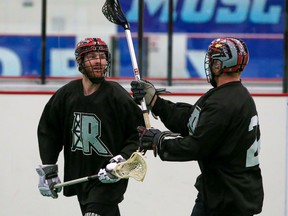 The Calgary Roughnecks’ Zach Currier, left, is the 2021 NLL Transition Player of the Year.