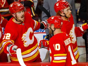 MacKenzie Weegar (left) and Jonathan Huberdeau are facing their former team for the first time since the trade that brought them to the Calgary Flames from the Florida Panthers.