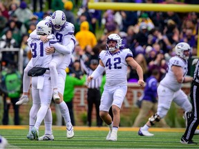 Nov 19, 2022; Waco, Texas, USA; TCU Horned Frogs place kicker Griffin Kell (39) and punter Jordy Sandy (31) and tight end Alex Honig (82) and tight end Brent Matiscik (42) celebrates the victory over the Baylor Bears after Kell kicks the game winning field goal against the Bears as time expires at McLane Stadium. Mandatory Credit: Jerome Miron-USA TODAY Sports